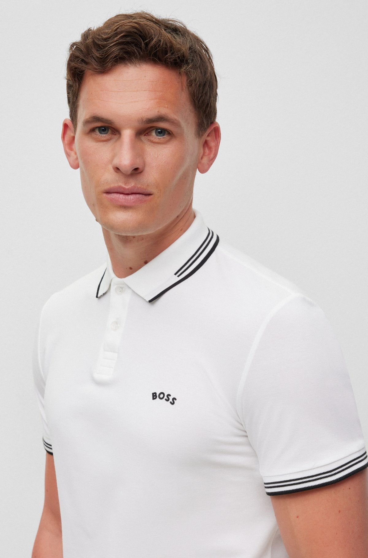 Slim-Fit Poloshirt aus Stretch-Baumwolle mit geschwungenem Logo